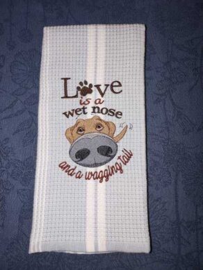 Love is a wet nose and wagging tail kitchen towel